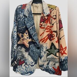 Step into a world of bold self-expression with this eye-catching blazer
